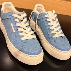 Tory Burch ladybug Stylish Blue and White Sneakers brand new. Never worn. No box